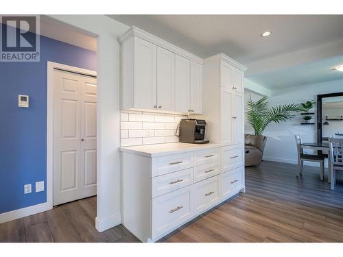 294 Marigold Road, Kelowna, BC - Indoor Photo Showing Kitchen With Fireplace With Upgraded Kitchen