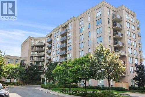 107 - 1730 Eglinton Avenue E, Toronto, ON - Outdoor With Facade