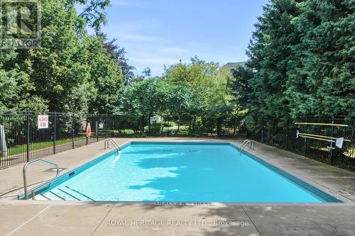 107 - 1730 Eglinton Avenue E, Toronto, ON - Outdoor With In Ground Pool With Backyard