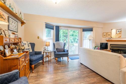 2915 Headon Forest Drive|Unit #9, Burlington, ON - Indoor Photo Showing Living Room With Fireplace