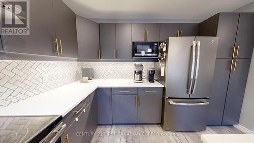 128 - 3400 Castle Rock Place, London, ON - Indoor Photo Showing Kitchen