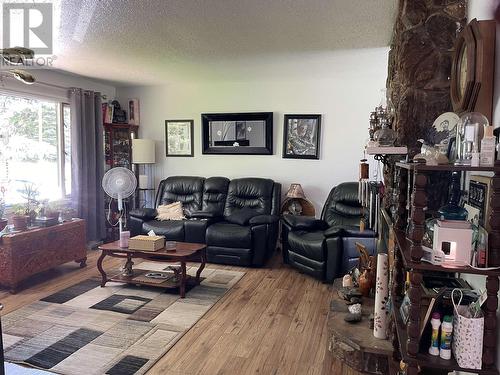8411 Sparrow Road, Prince George, BC - Indoor Photo Showing Living Room With Fireplace