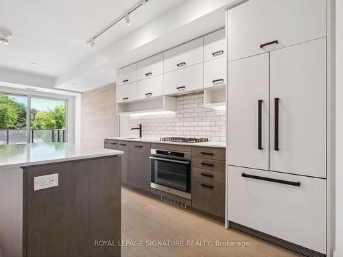 309-1888 Queen St E, Toronto, ON - Indoor Photo Showing Kitchen With Upgraded Kitchen