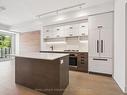 309-1888 Queen St E, Toronto, ON  - Indoor Photo Showing Kitchen With Upgraded Kitchen 