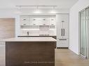 309-1888 Queen St E, Toronto, ON  - Indoor Photo Showing Kitchen 