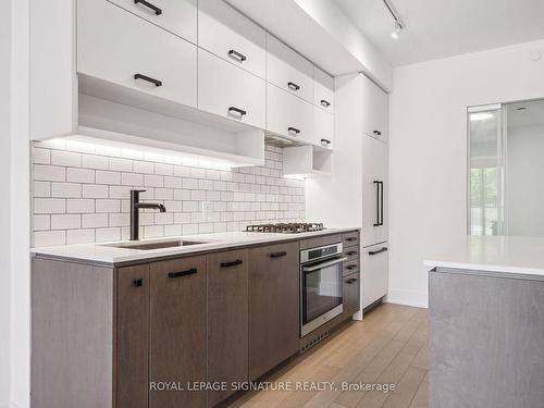 309-1888 Queen St E, Toronto, ON - Indoor Photo Showing Kitchen With Upgraded Kitchen