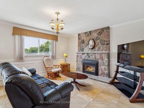 38 Larchmere Ave, Toronto, ON - Indoor Photo Showing Living Room With Fireplace