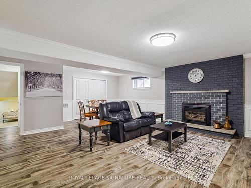 38 Larchmere Ave, Toronto, ON - Indoor Photo Showing Living Room With Fireplace