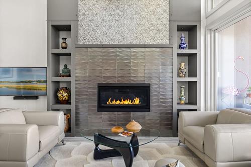 1290 Ponds Avenue, Kelowna, BC - Indoor Photo Showing Living Room With Fireplace