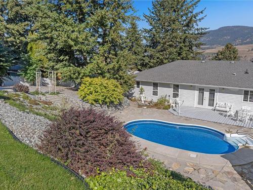 11058 Eva Road, Lake Country, BC - Outdoor With In Ground Pool