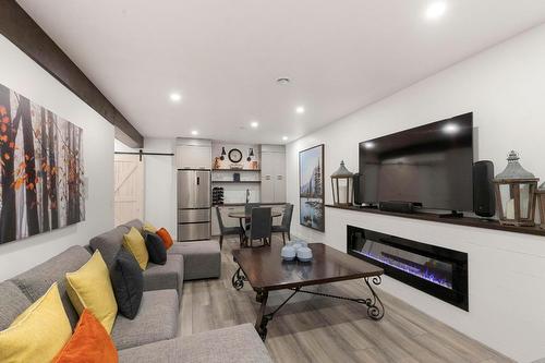 2069 Elkridge Drive, West Kelowna, BC - Indoor Photo Showing Living Room With Fireplace