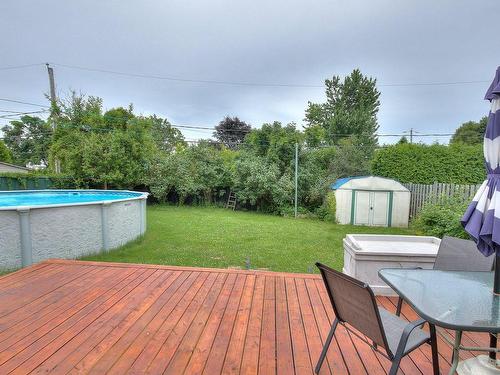 Backyard - 21 Rue Benoit, Vaudreuil-Dorion, QC - Outdoor With Above Ground Pool With Backyard