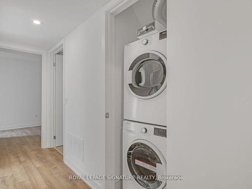 Th5-30 Ed Clark Gdns, Toronto, ON - Indoor Photo Showing Laundry Room