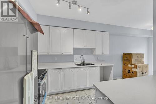 38 Gristone Crescent, Toronto, ON - Indoor Photo Showing Kitchen With Double Sink