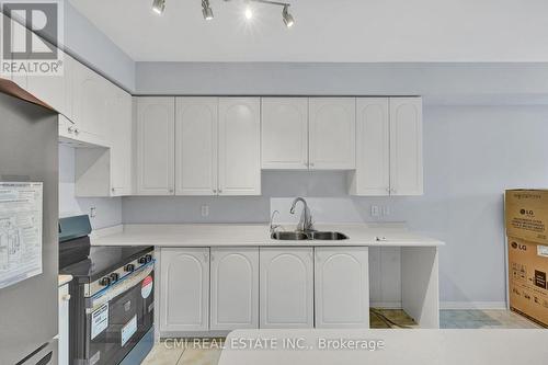 38 Gristone Crescent, Toronto, ON - Indoor Photo Showing Kitchen With Double Sink