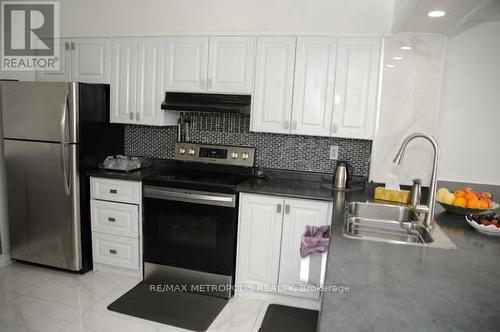 1011 - 410 Mclevin Avenue, Toronto, ON - Indoor Photo Showing Kitchen With Double Sink