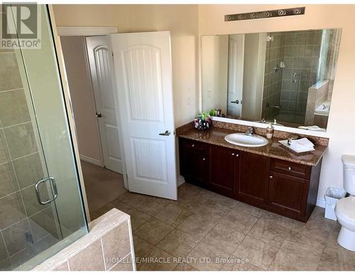 27 Swenson Street, New Tecumseth, ON - Indoor Photo Showing Bathroom