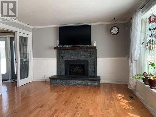 9437 6 Street, Dawson Creek, BC - Indoor Photo Showing Living Room With Fireplace