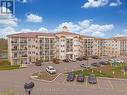 202 - 80 Shipway Avenue, Clarington, ON  - Outdoor With Balcony With Facade 