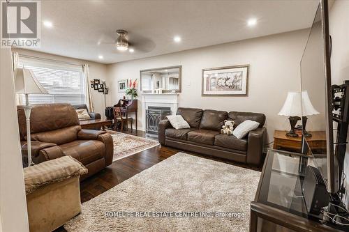 48 Prince Of Wales Drive, Barrie, ON - Indoor Photo Showing Living Room With Fireplace