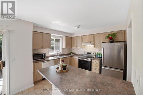 48 - 9800 Mclaughlin Road, Brampton, ON - Indoor Photo Showing Kitchen With Double Sink