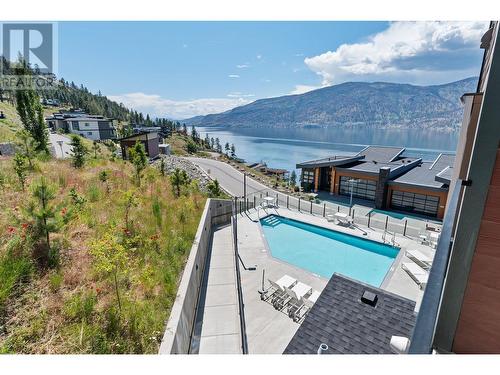 3475 Granite Close Unit# 316, Kelowna, BC - Indoor Photo Showing Bedroom With Body Of Water