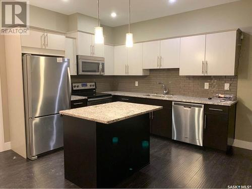 103 415 Maningas Bend, Saskatoon, SK - Indoor Photo Showing Kitchen With Stainless Steel Kitchen With Upgraded Kitchen