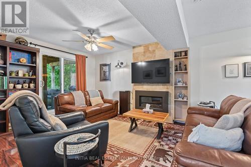 35 Paperbirch Crescent, London, ON - Indoor Photo Showing Living Room With Fireplace