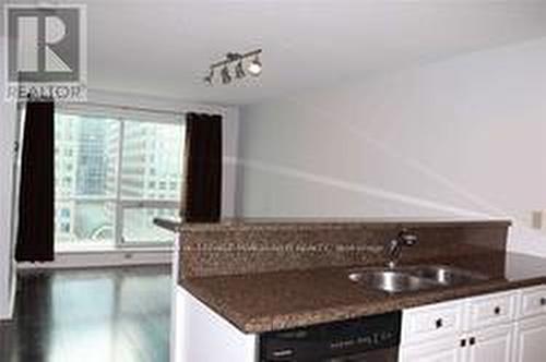 1009 - 10 Queens Quay W, Toronto, ON - Indoor Photo Showing Kitchen With Double Sink