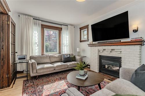 94 Holton Avenue S, Hamilton, ON - Indoor Photo Showing Living Room With Fireplace