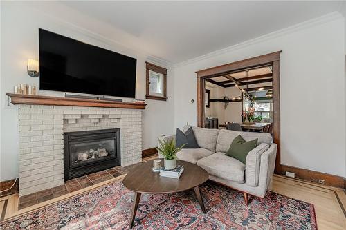 94 Holton Avenue S, Hamilton, ON - Indoor Photo Showing Living Room With Fireplace