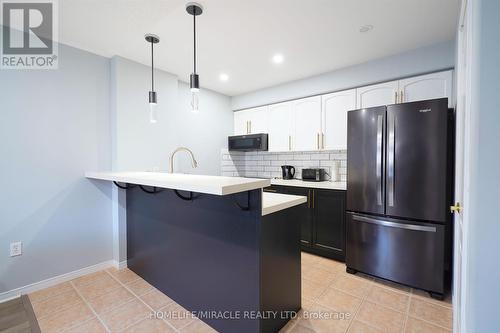 303 - 300 Spillsbury Drive, Peterborough, ON - Indoor Photo Showing Kitchen With Upgraded Kitchen