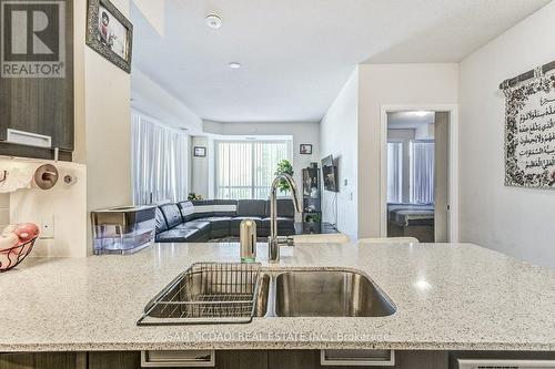 413 - 35 Watergarden Drive, Mississauga, ON - Indoor Photo Showing Kitchen With Double Sink With Upgraded Kitchen