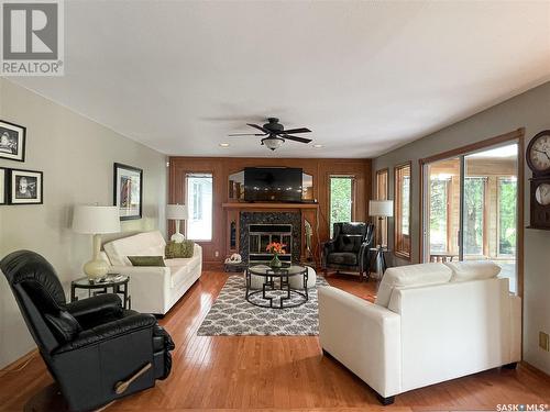 2 Evergreen Estates Drive, Meadow Lake, SK - Indoor Photo Showing Living Room With Fireplace