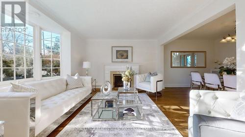 19 Strathgowan Crescent, Toronto, ON - Indoor Photo Showing Living Room With Fireplace