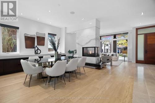 101 Rykert Crescent, Toronto, ON - Indoor Photo Showing Dining Room With Fireplace