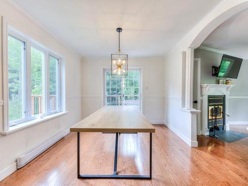 Kitchen - 208 Ch. Godefroy, Sainte-Anne-Des-Lacs, QC - Indoor Photo Showing Dining Room With Fireplace