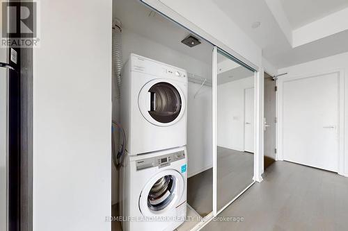 3003 - 70 Temperance Street, Toronto, ON - Indoor Photo Showing Laundry Room