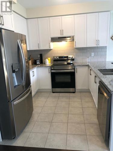 56 Janes Crescent, New Tecumseth, ON - Indoor Photo Showing Kitchen