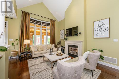 11 - 3353 Liptay Avenue, Oakville, ON - Indoor Photo Showing Living Room With Fireplace