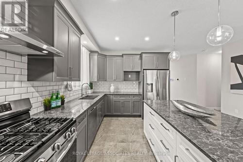 17 Tindall Crescent, East Luther Grand Valley, ON - Indoor Photo Showing Kitchen With Stainless Steel Kitchen With Double Sink With Upgraded Kitchen