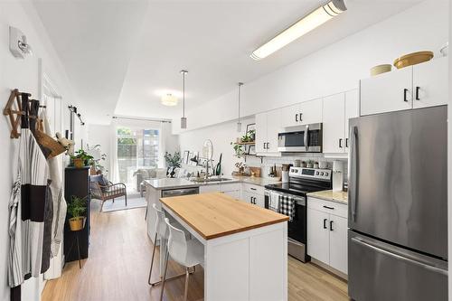 209 247 River Avenue, Winnipeg, MB - Indoor Photo Showing Kitchen With Upgraded Kitchen