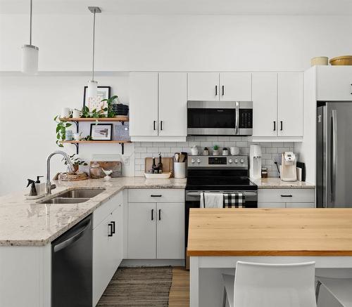 209 247 River Avenue, Winnipeg, MB - Indoor Photo Showing Kitchen With Double Sink With Upgraded Kitchen