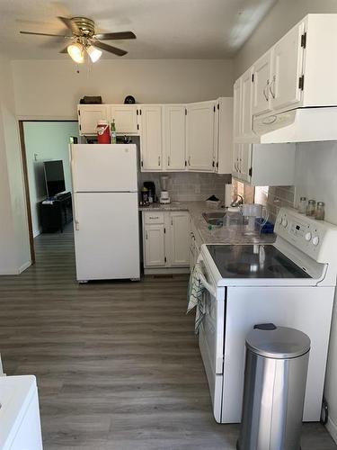 216 1St Street, Brandon, MB - Indoor Photo Showing Kitchen