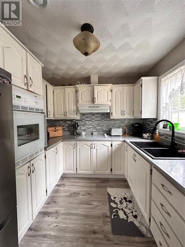 15 Dunford Place, Marystown, NL - Indoor Photo Showing Kitchen With Double Sink