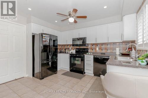 1057 Kennedy Circle, Milton, ON - Indoor Photo Showing Kitchen With Double Sink