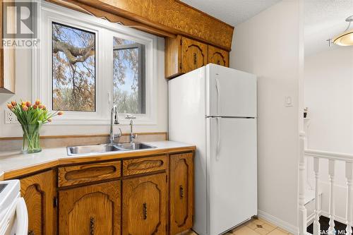 15 Le Jeune Place, Regina, SK - Indoor Photo Showing Kitchen With Double Sink