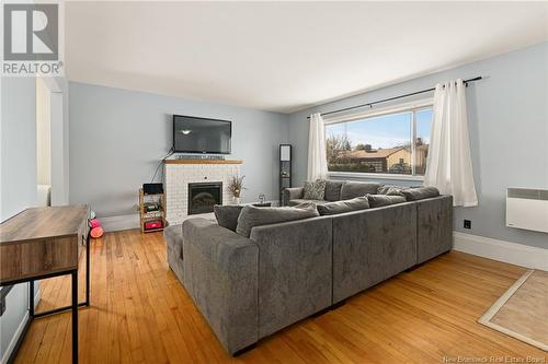 59 Anne Street, Moncton, NB - Indoor Photo Showing Living Room With Fireplace