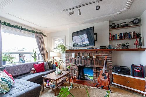 54 Mcnairn Ave, Toronto, ON - Indoor Photo Showing Living Room With Fireplace