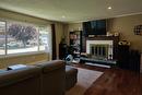 150 Bracewell Drive, Penticton, BC  - Indoor Photo Showing Living Room With Fireplace 